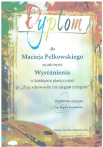 Dyplom dla Macieja Pelkowskiego za zdobycie wyróżnienia w konkursie plastycznym pt. "Żyję zdrowo - bo nie ulegam nałogom"